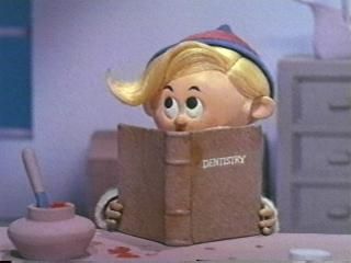 or, "Will the real Dentist Elf please stand up?  the original Romeo Muller scripts   and he named and spelled the character's name as HERMEY (never HERBIE).